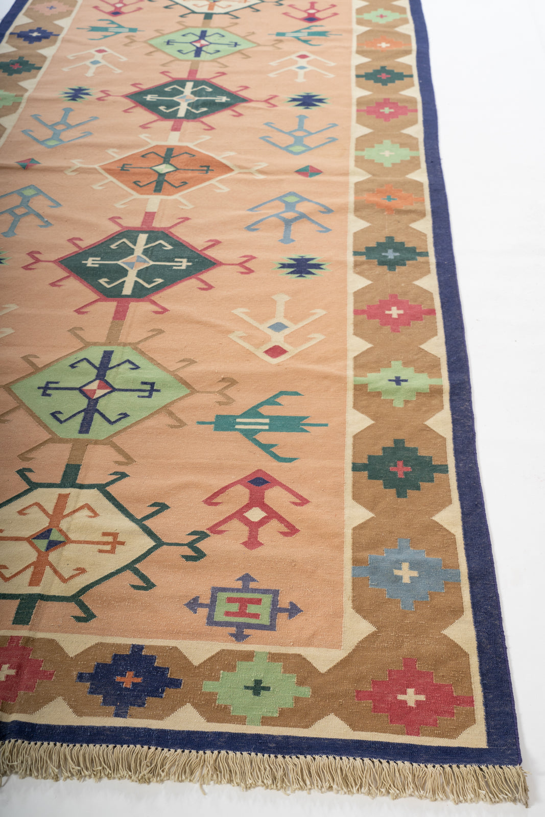 Rann of Kutch Artisan Flatweave Rug cotton rug styled in a living room interior