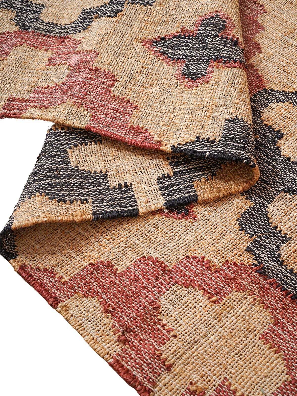 Rouge Reflection Jute Rug detail of the geometric pattern in jute