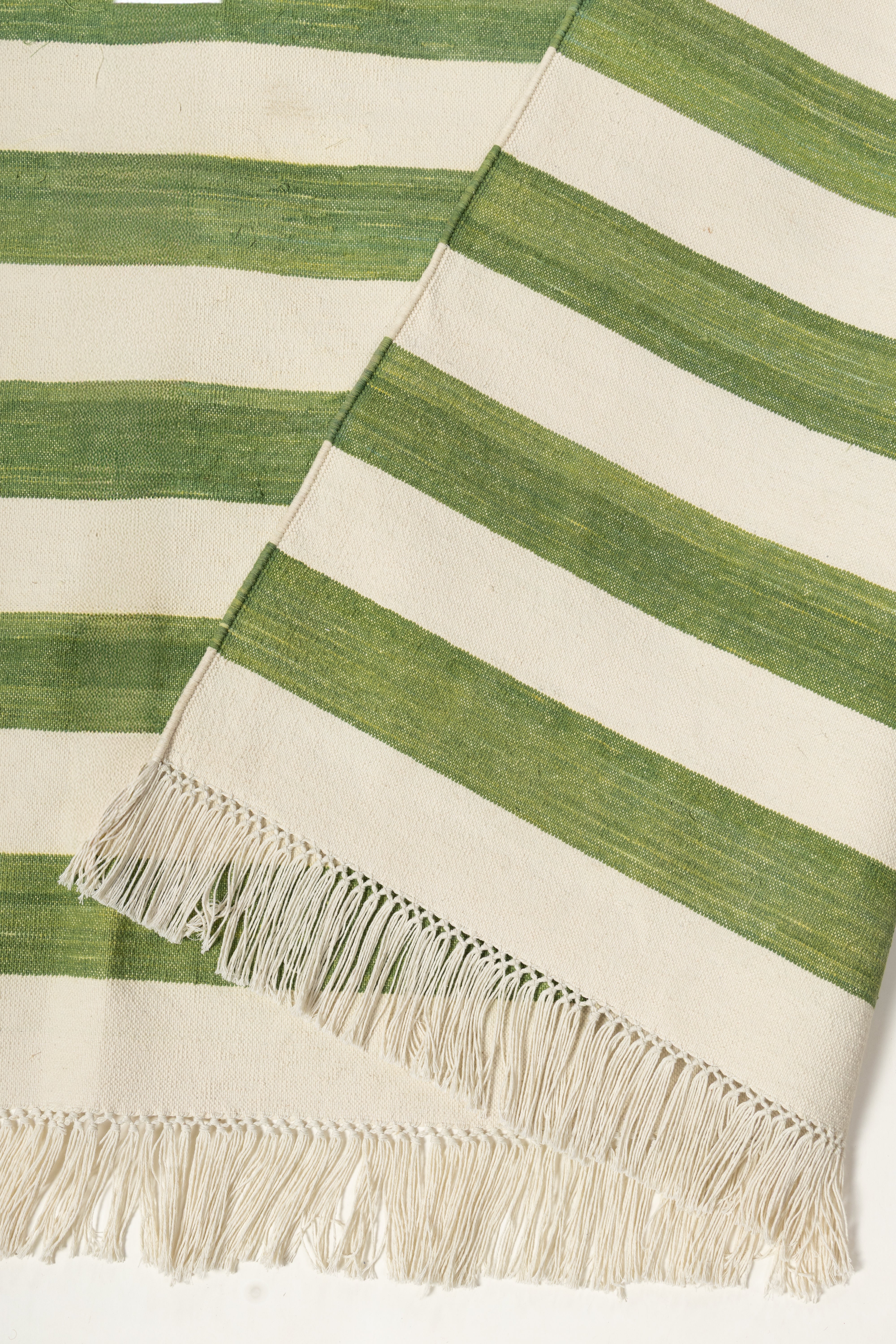 Sage Coast Flatweave Rug detail of the striped cotton surface and edge finishing