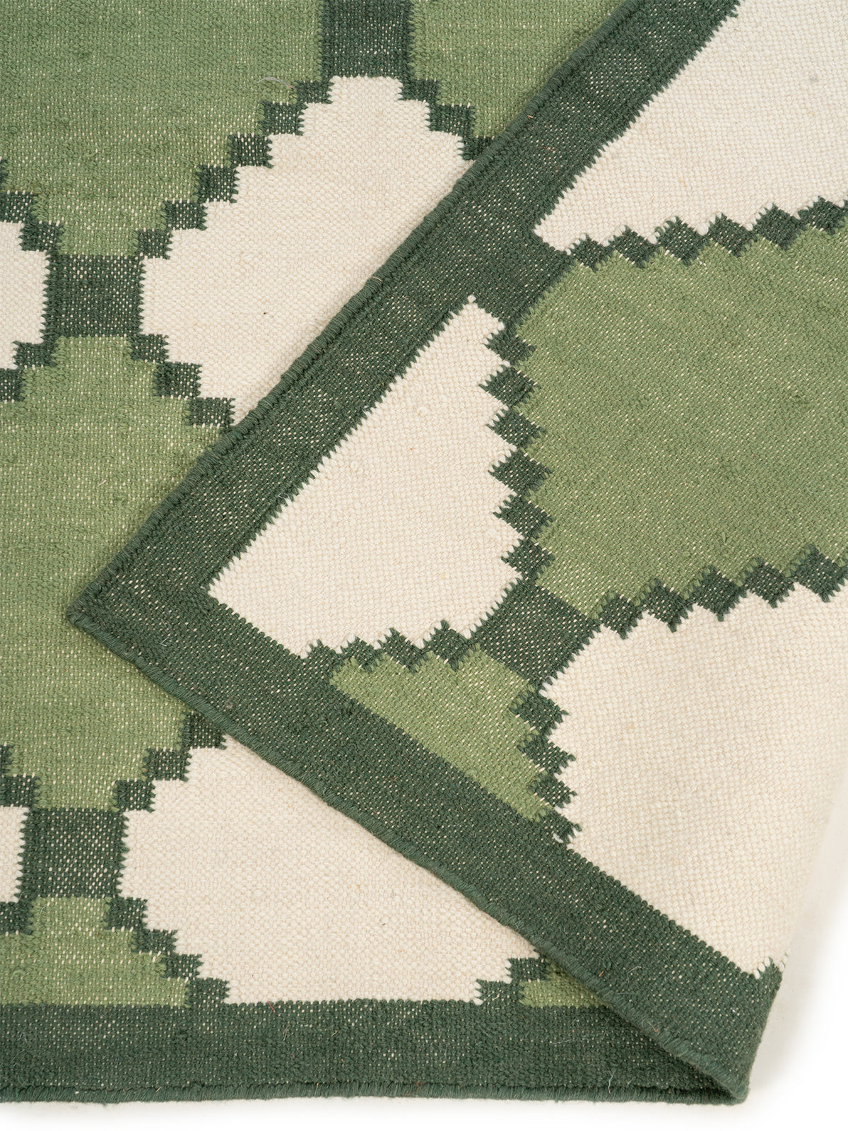 Sage Harlequin Wool Flatweave Rug detail of the geometric pattern in wool