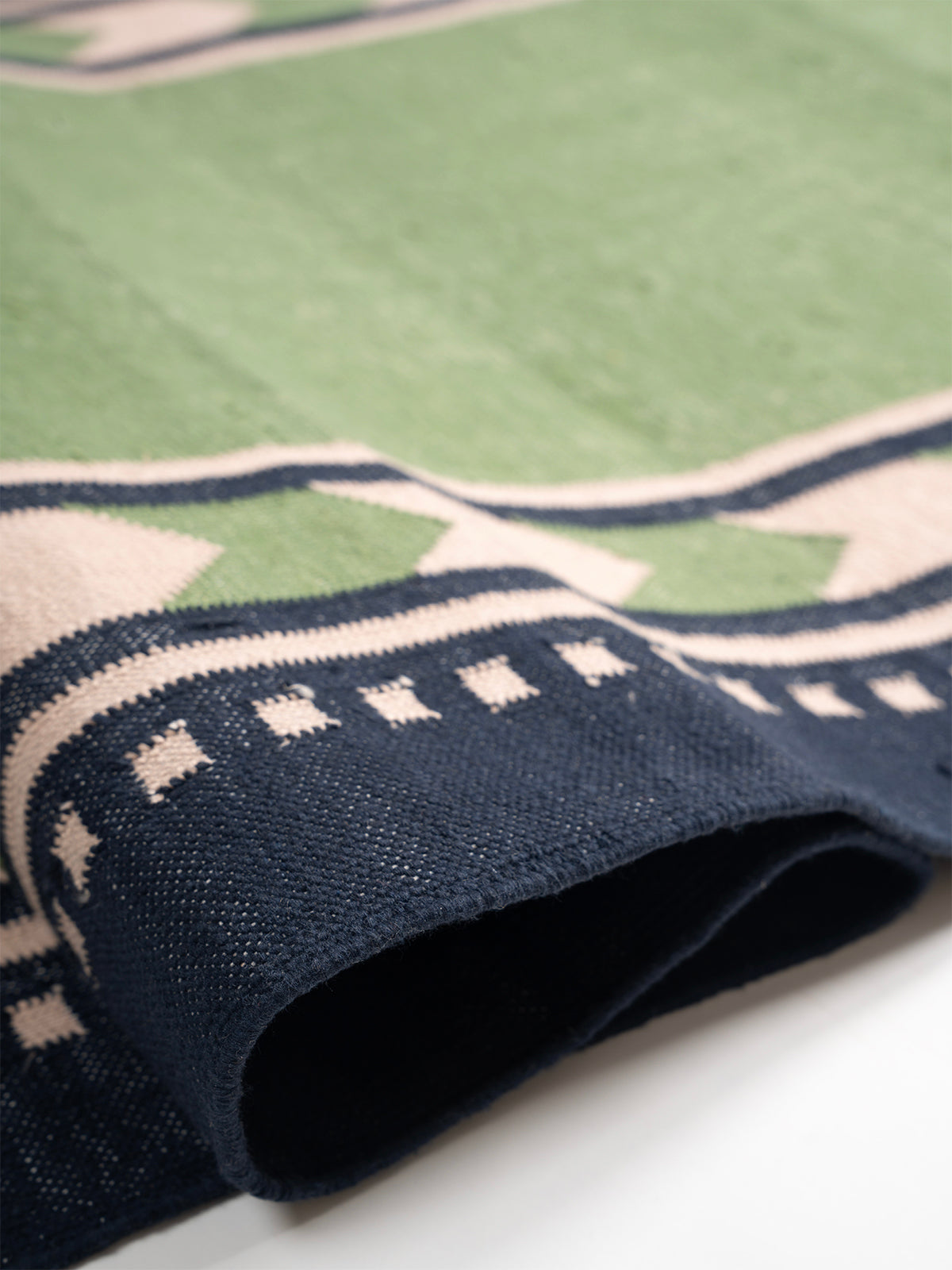 Sage Moor Runner close-up showing the cotton weave and stripes surface