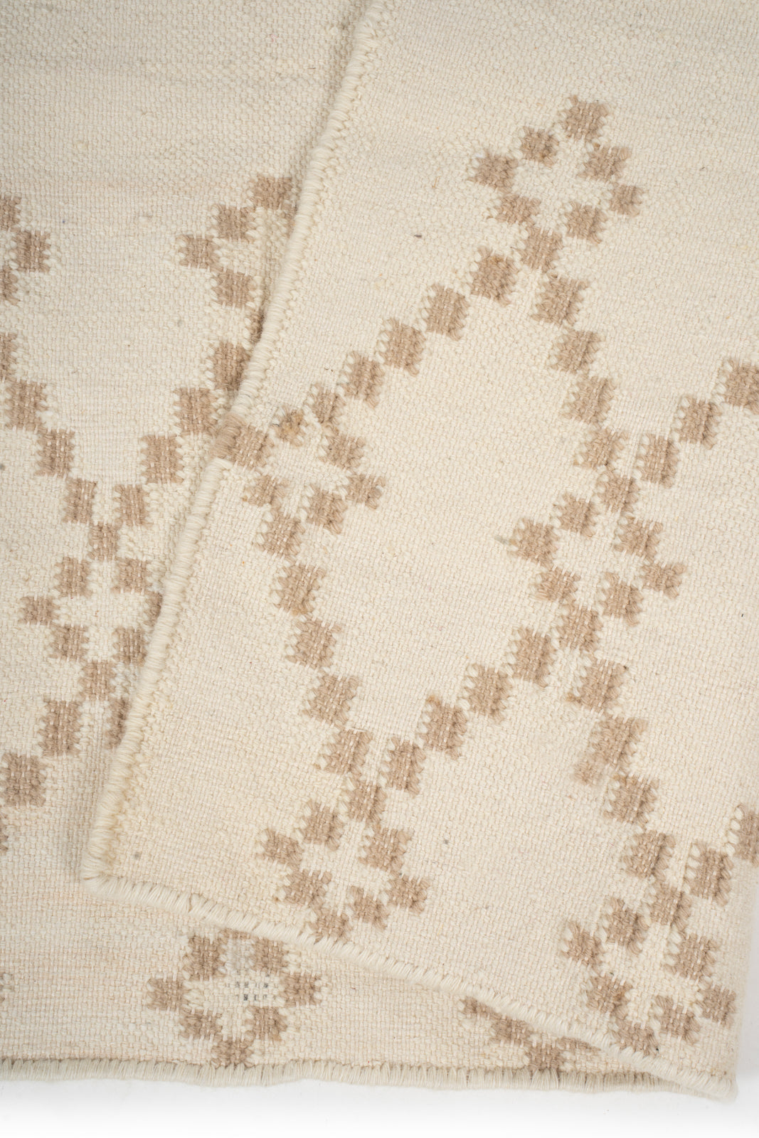 Sahara Mirage Wool Rug detail of the geometric pattern in wool