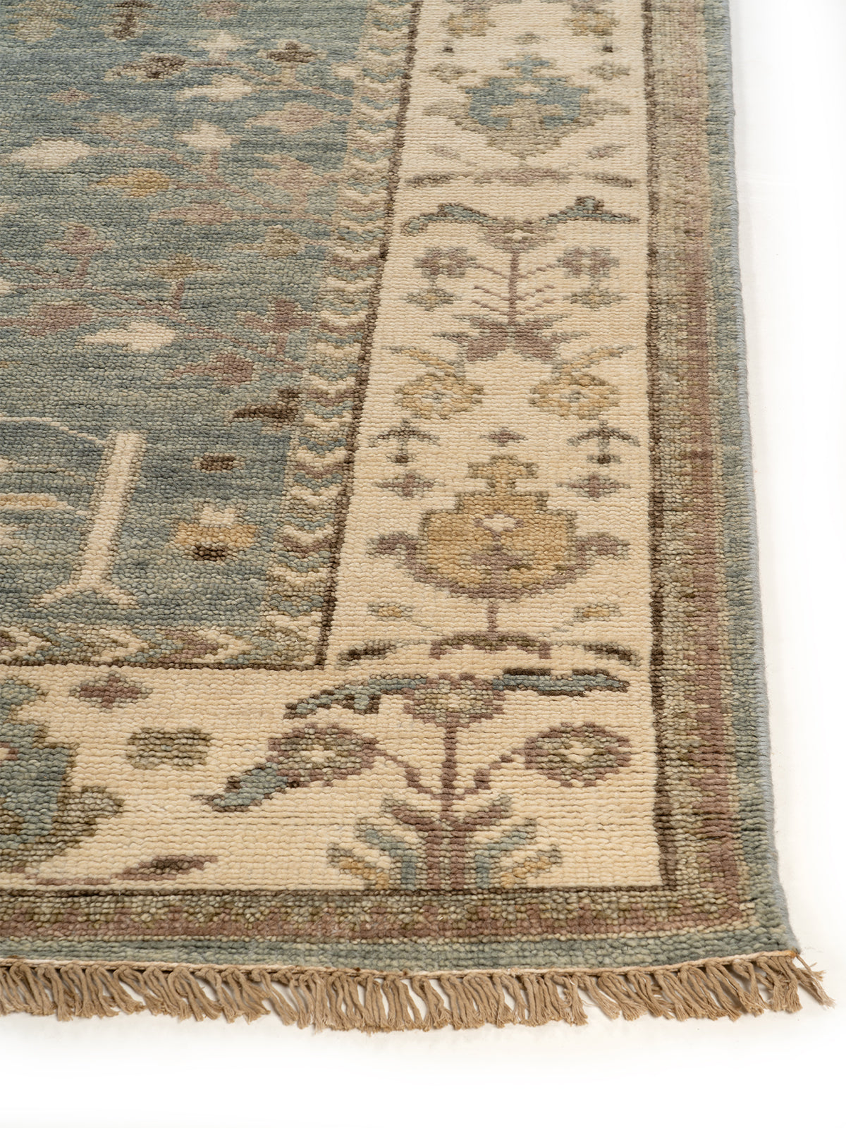Samarkand Meadow handspun wool rug styled in a living room interior
