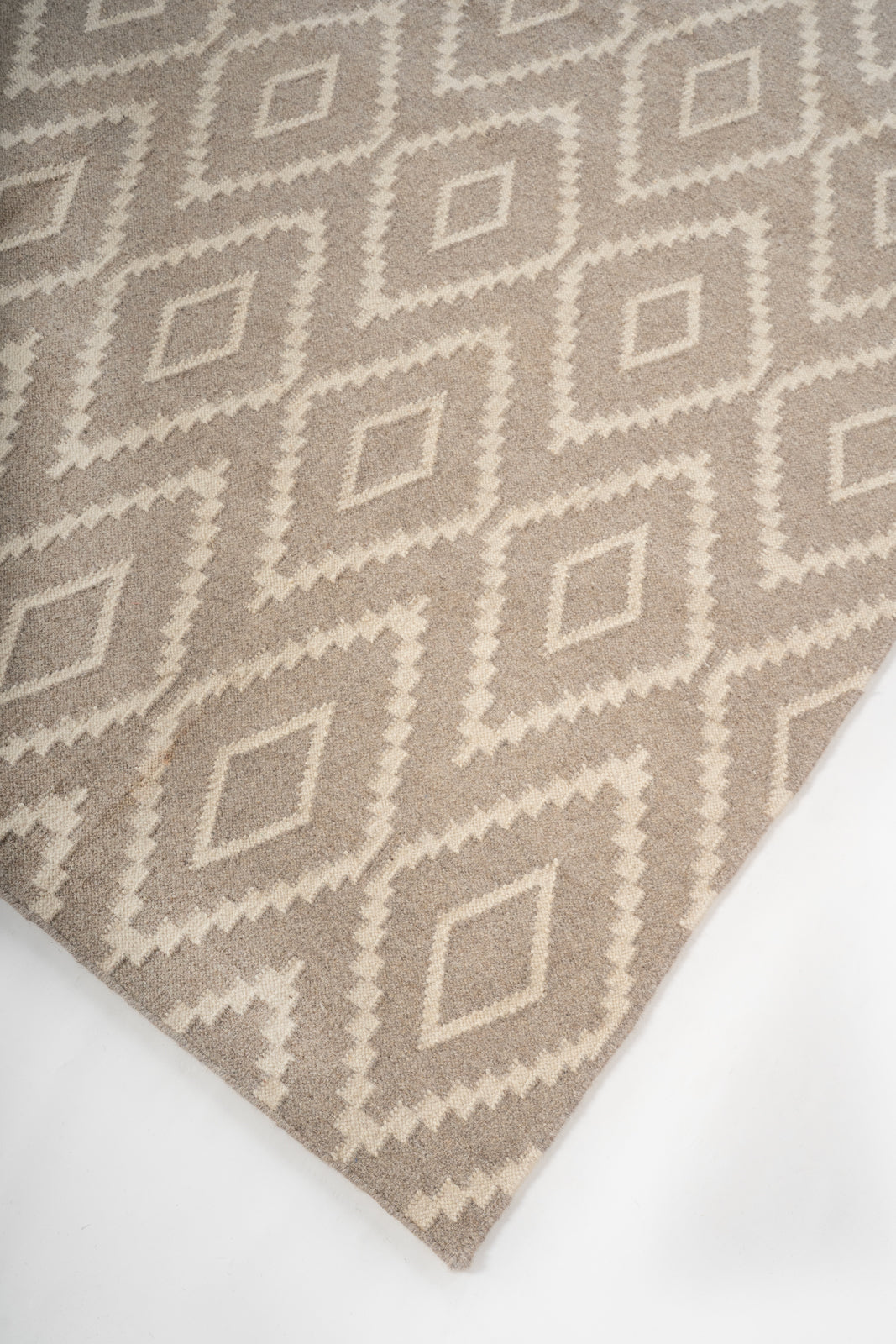 Sandstone Diamond Wool Rug close-up showing the wool weave and geometric motif