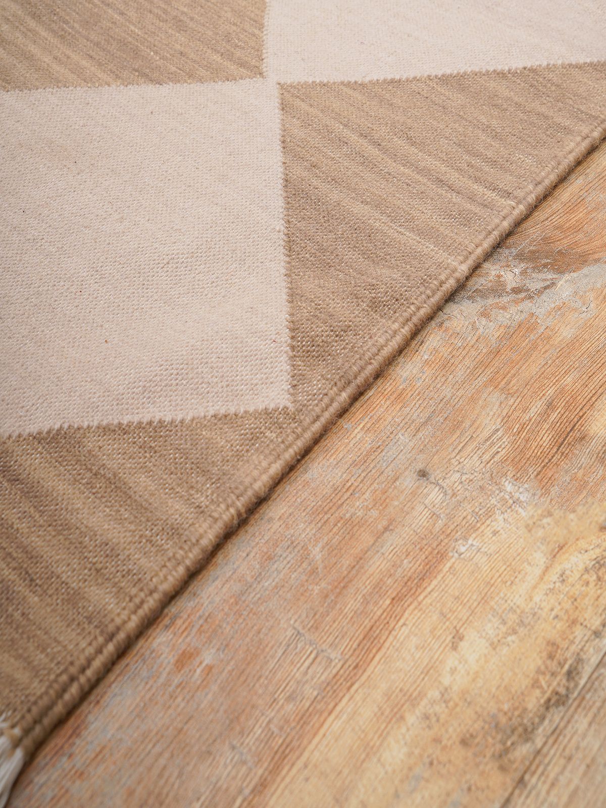 Sandstone Serenade Flatweave Rug close-up showing the cotton weave and striped pattern