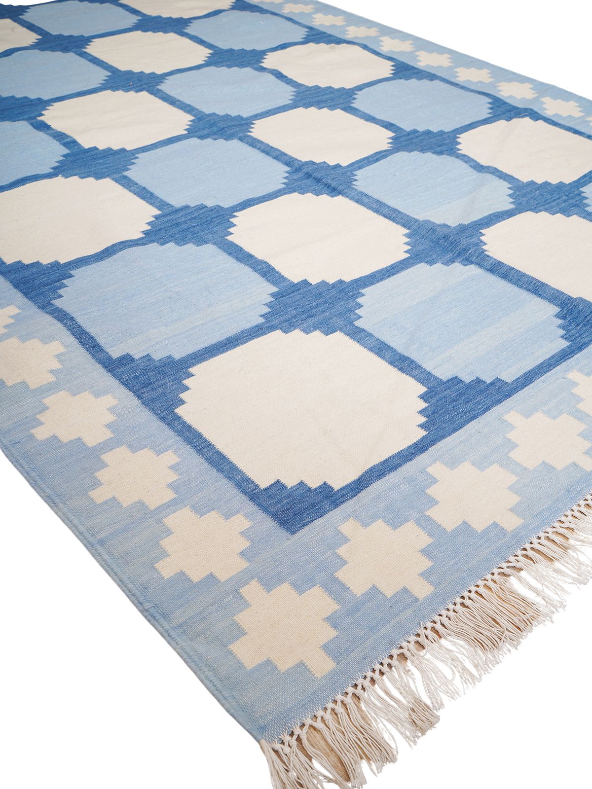 Sapphire Essence Flatweave Rug-Blue cotton rug styled in a living room interior