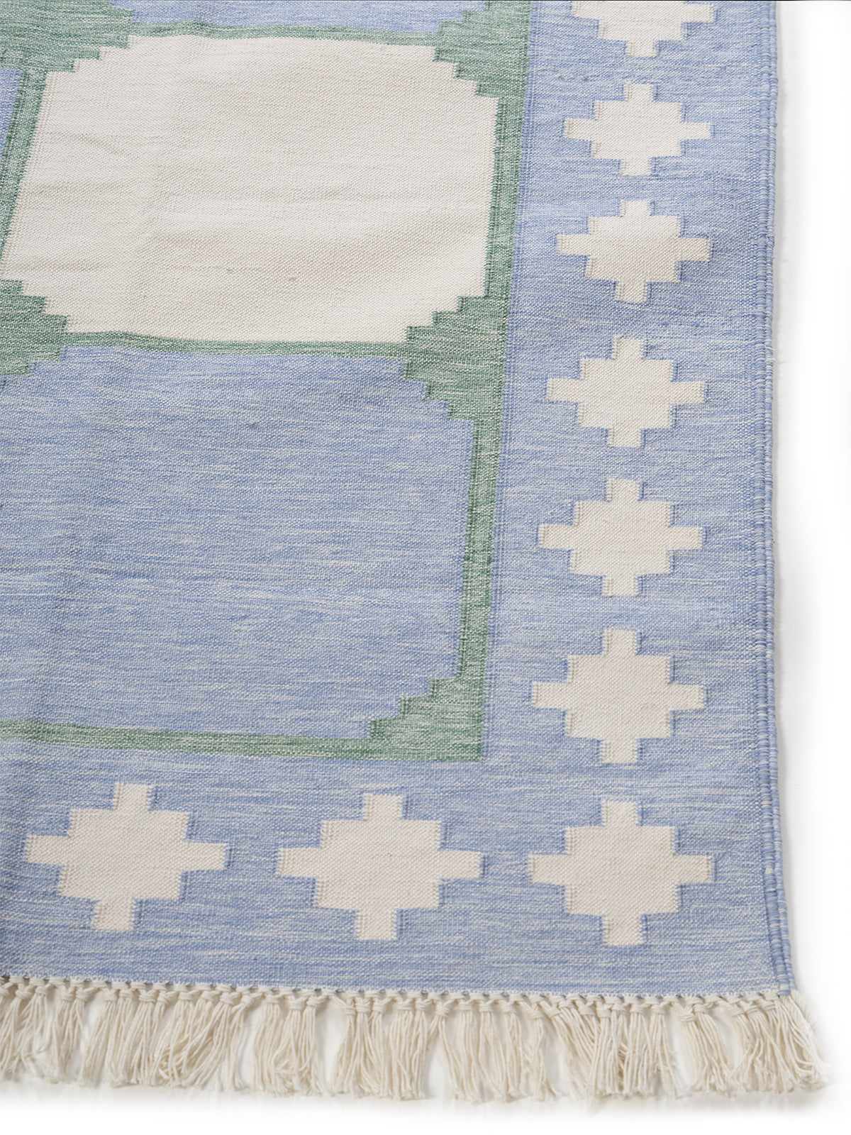 Sapphire Essence Flatweave Rug-Emerald cotton rug styled in a living room interior with timber and linen