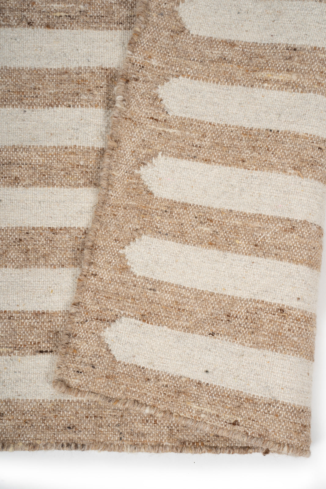 Savannah Horizon Wool Rug detail of the striped wool surface and edge finishing