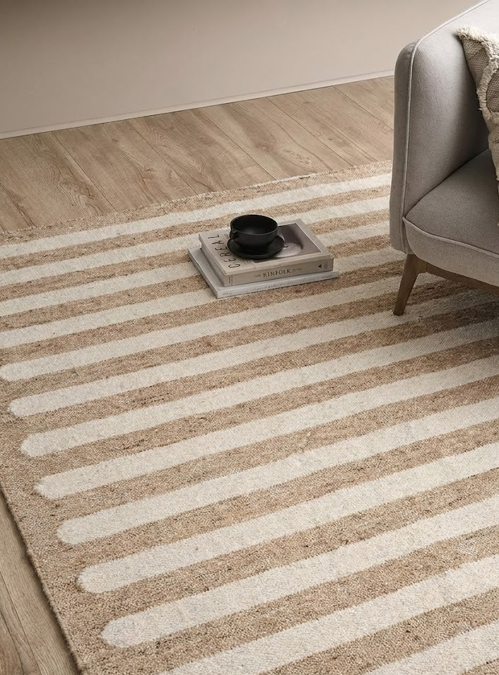 Savannah Horizon Wool Rug wool rug styled in a living room interior
