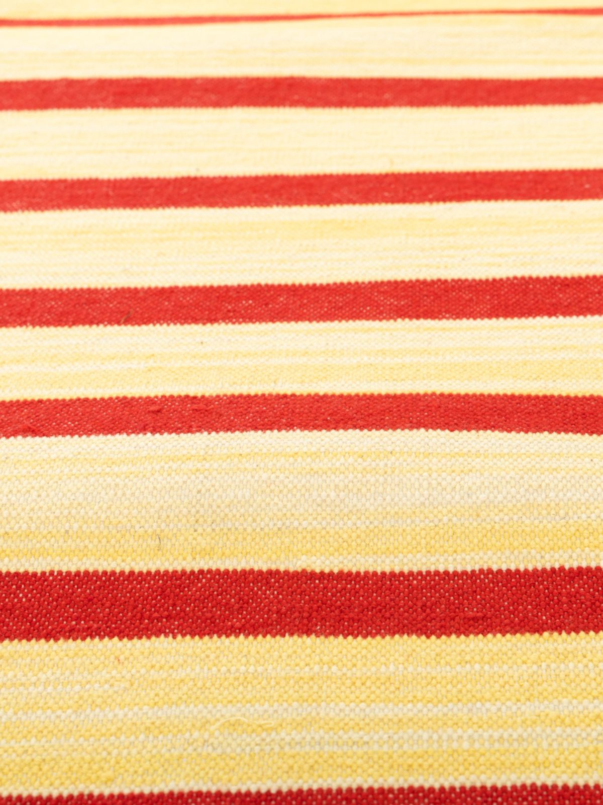 Serenity Stripes Flatweave Rug-Red - texture detail showing cotton surface