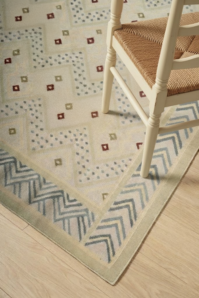Sikar Sage Flatweave Rug cotton rug styled in a living room interior