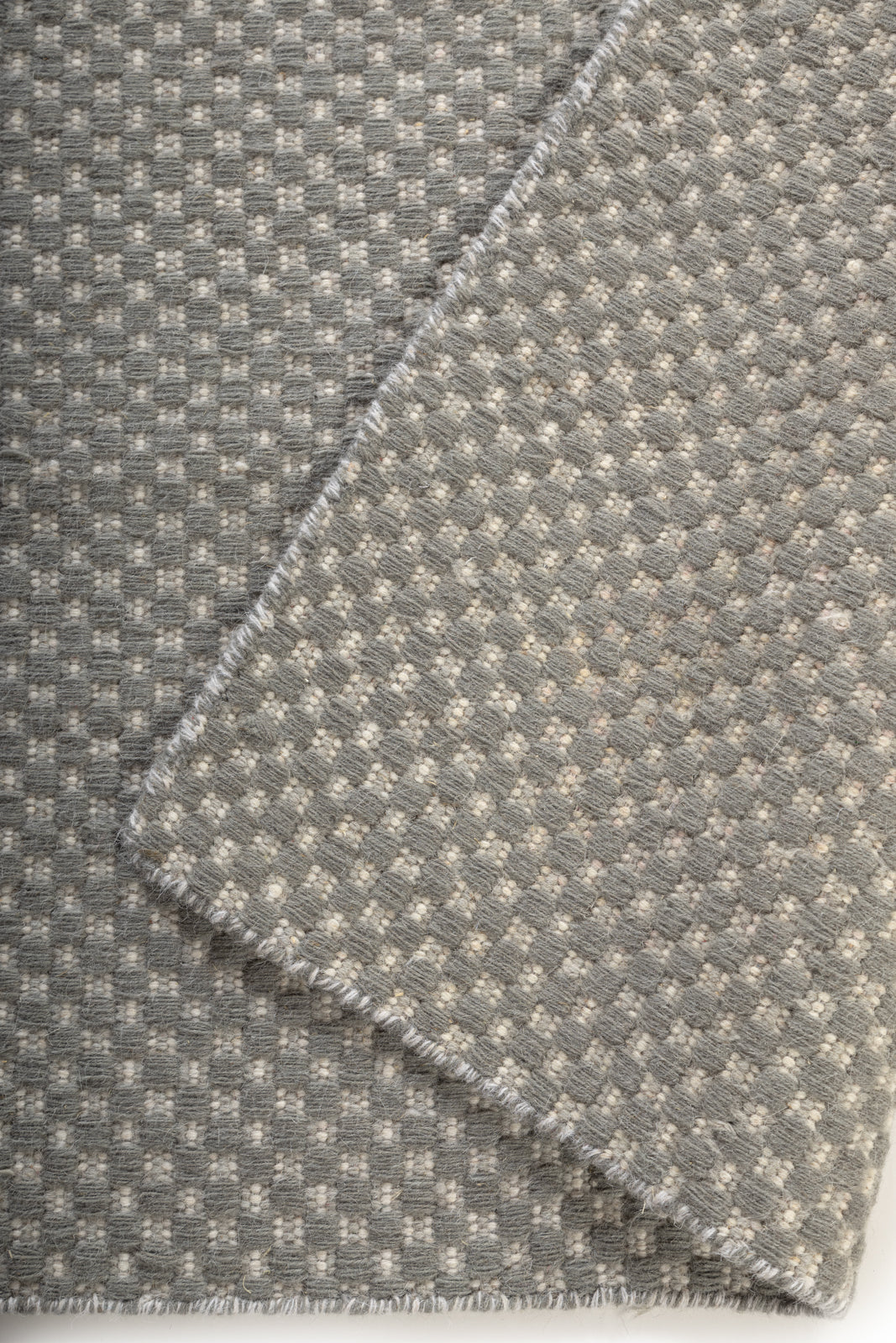 Slatefield Flatweave detail showing the textured wool surface and finishing