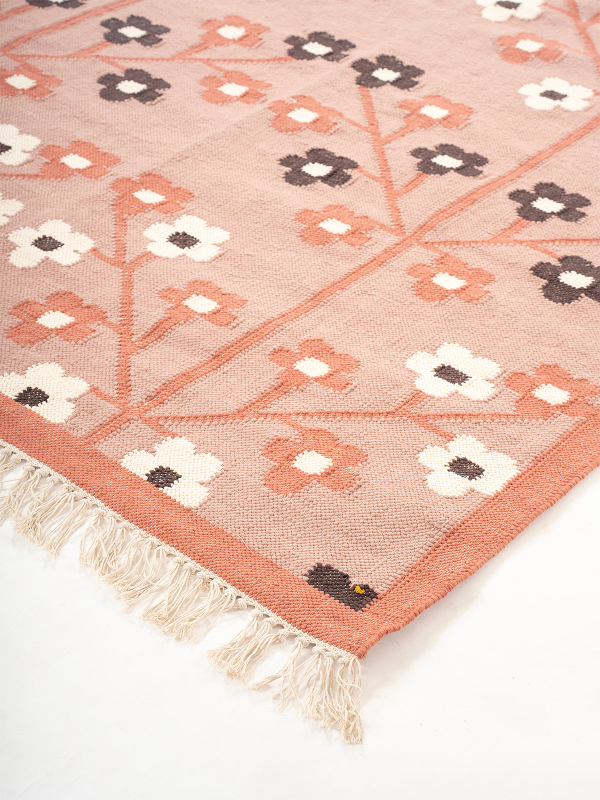 Spring Petals Handwoven Wool Rug close-up showing the wool pile and floral motif