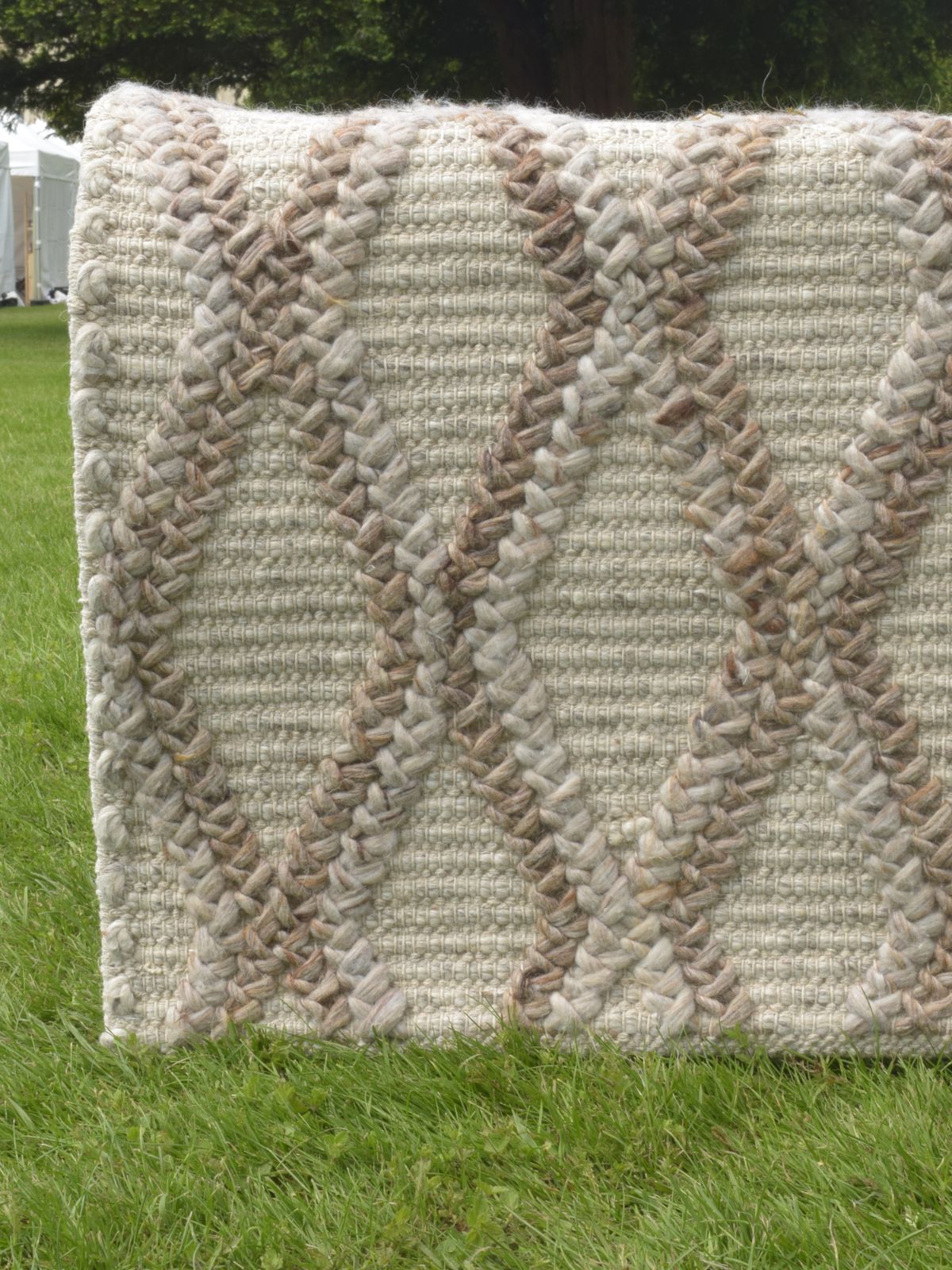 Stellar Geometry Handcrafted Rug wool rug styled in a living room interior