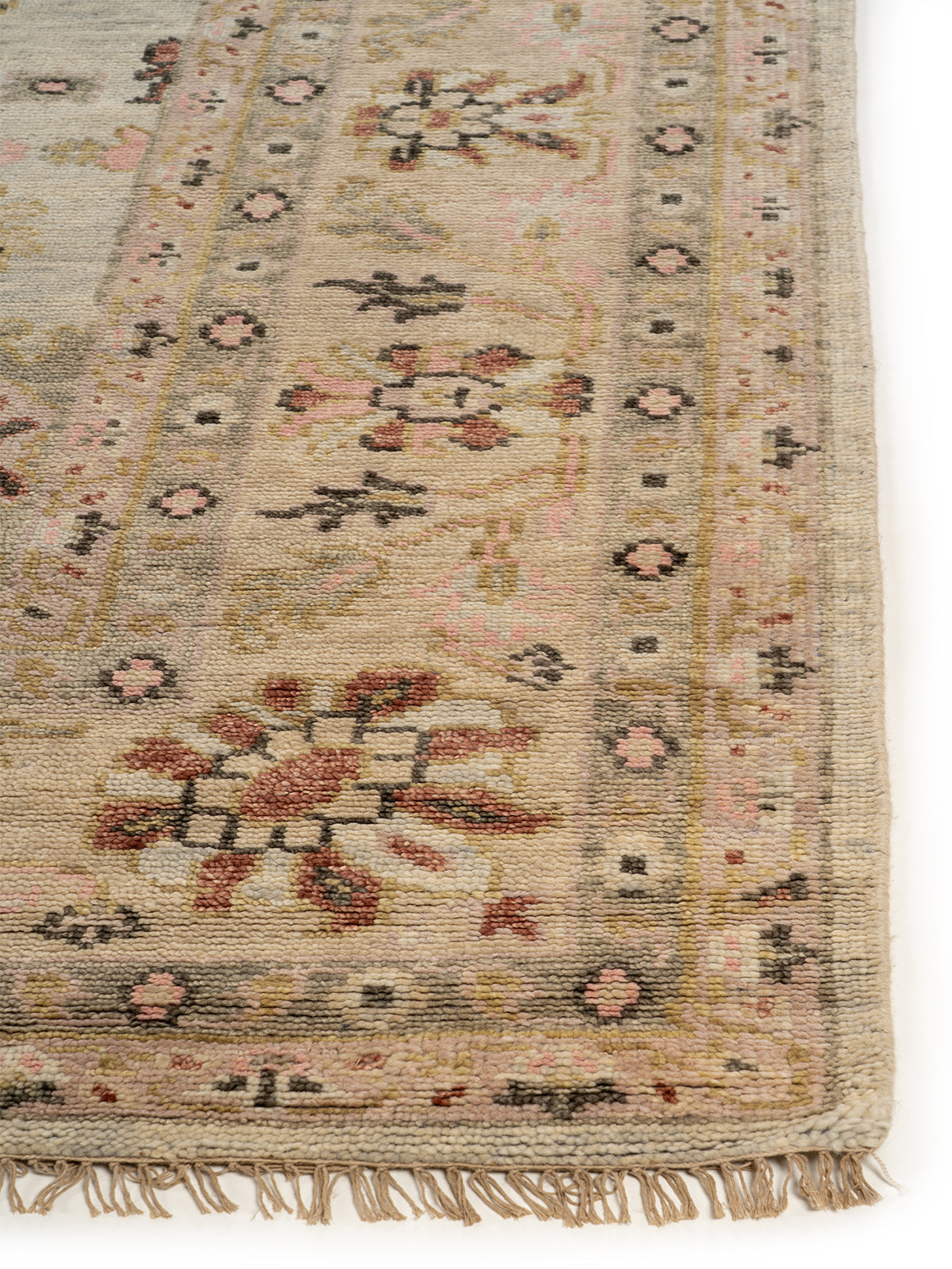 Sultanabad Mist handspun wool rug styled in a living room interior