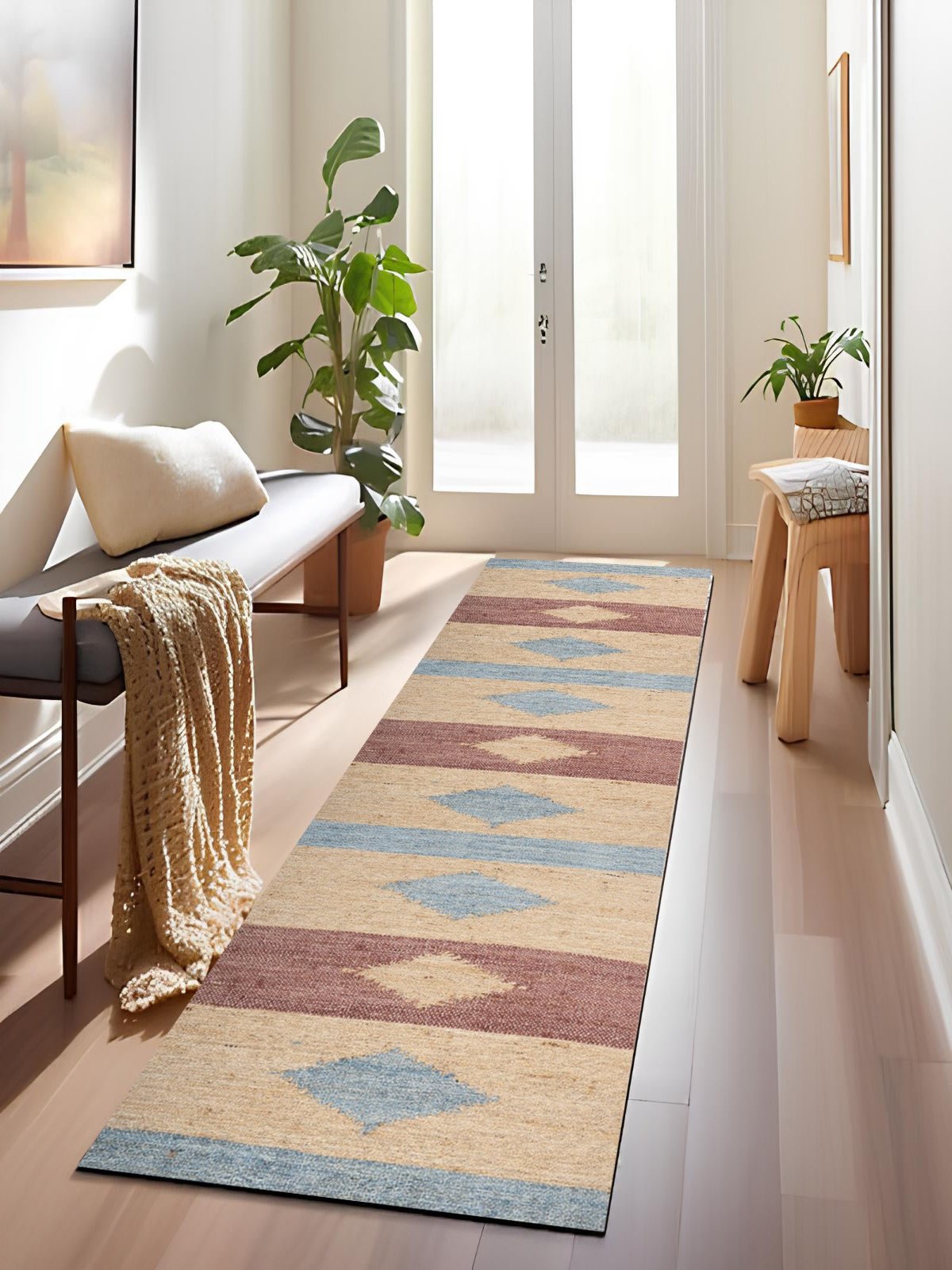 Sundown Mirage Jute Runner Rug jute stair runner styled on a staircase in a designed interior