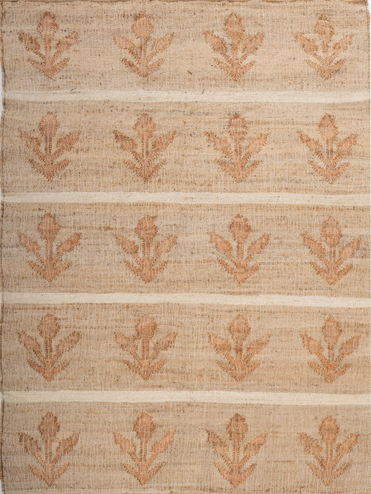 Sunset Grove Handwoven Jute Rug jute rug in red tones