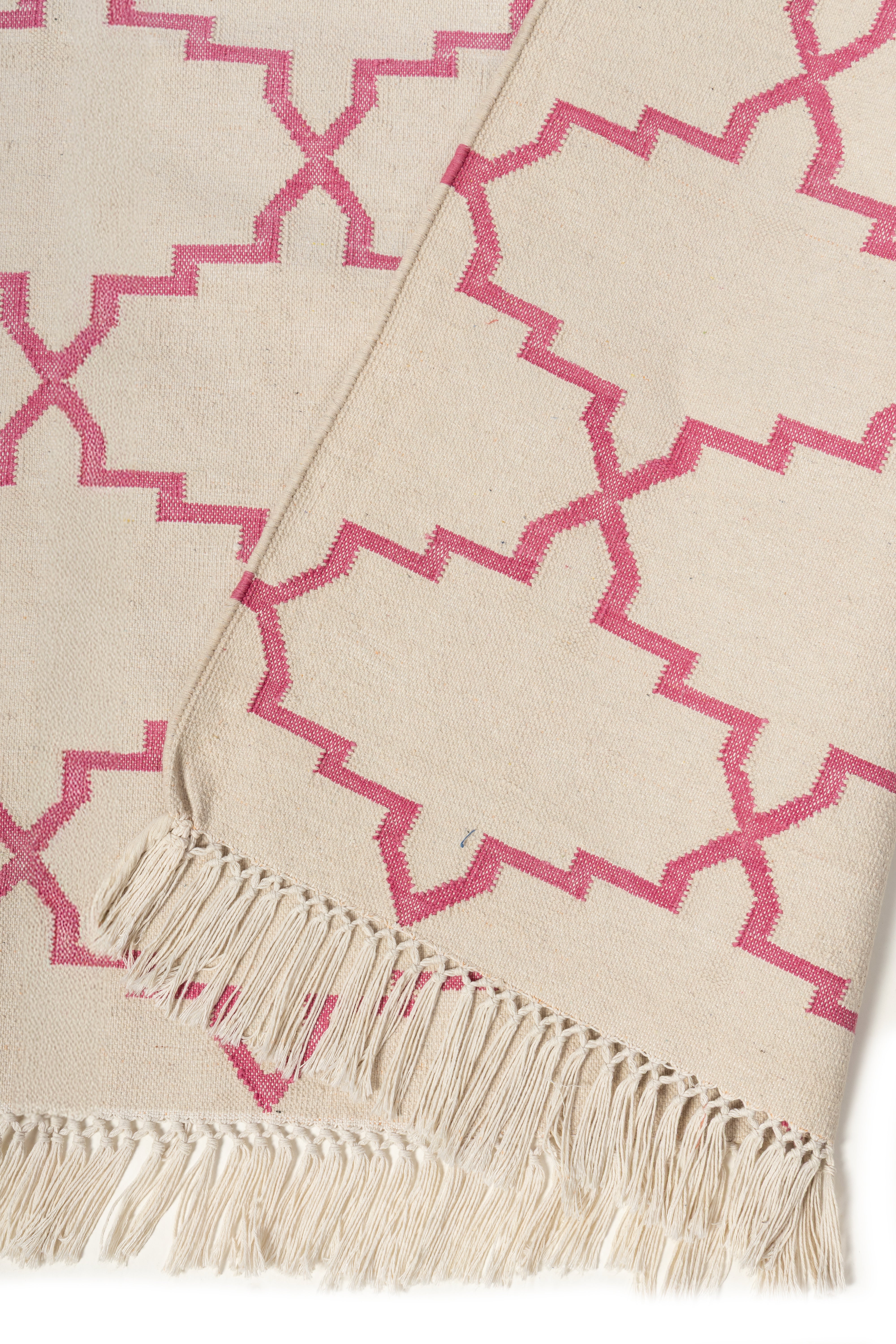 Symmetry Flatweave Rug-Pink cotton rug styled in a living room interior