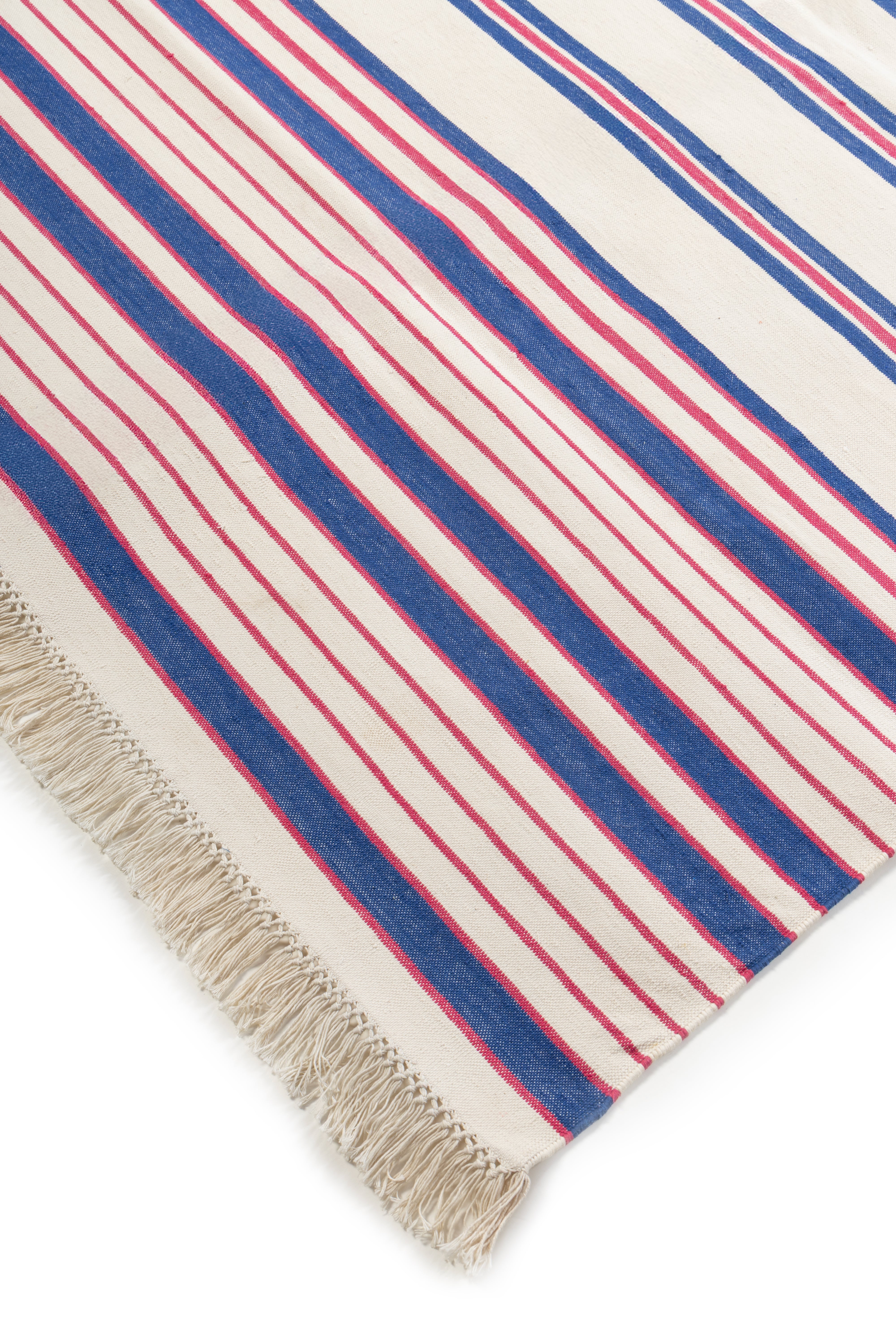 Temple Stripe Flatweave rug-Red close-up showing the cotton weave and striped pattern