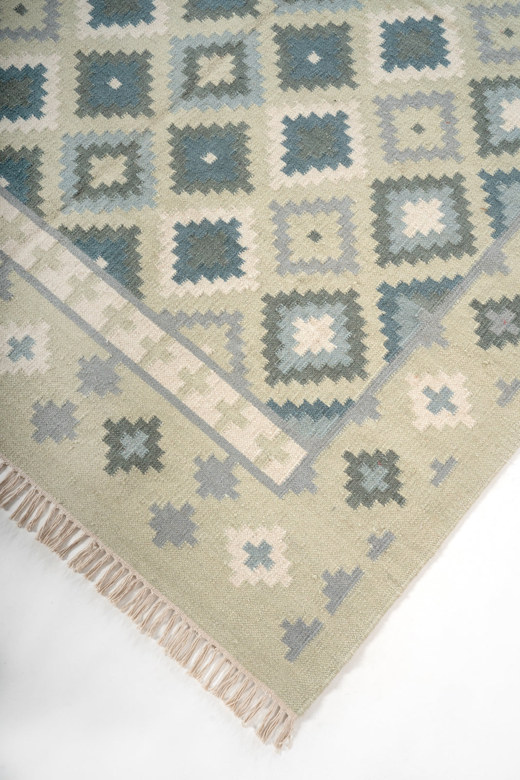 Thar Sandstone Heritage Rug close-up showing the wool weave and traditional motif