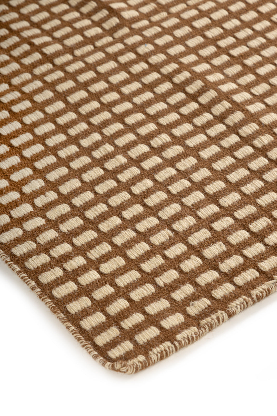 The Artisan Waffle close-up showing the wool weave and surface texture