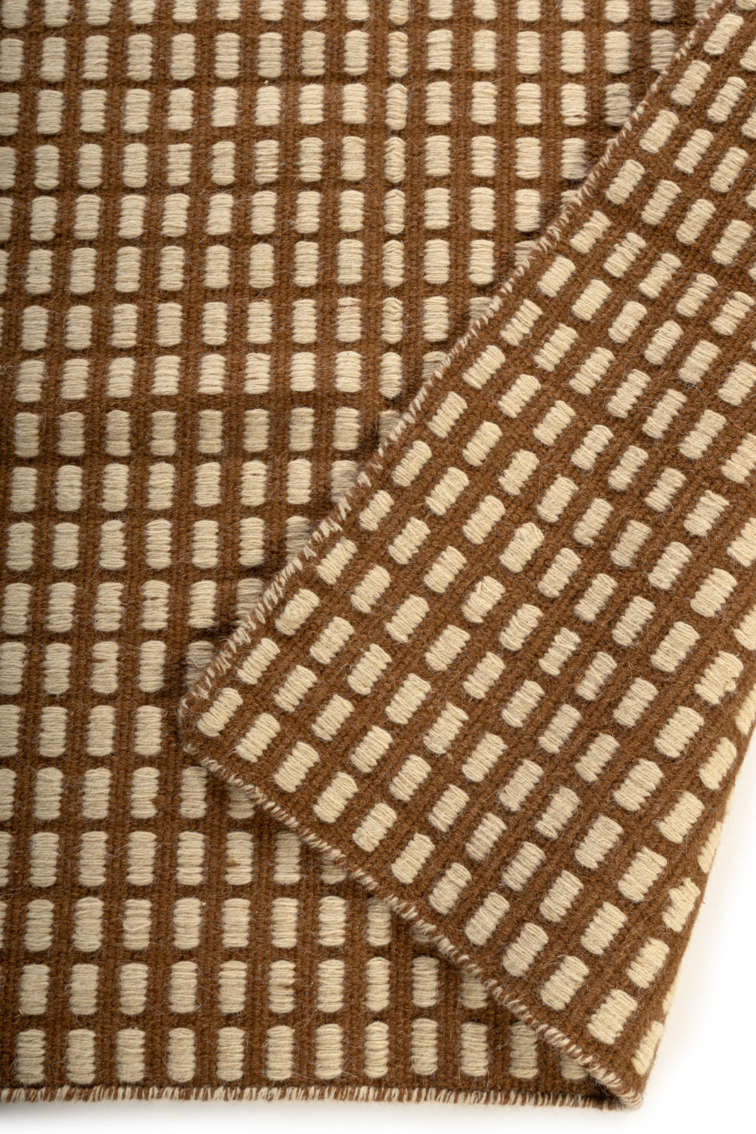 The Artisan Waffle detail showing the textured wool surface and finishing