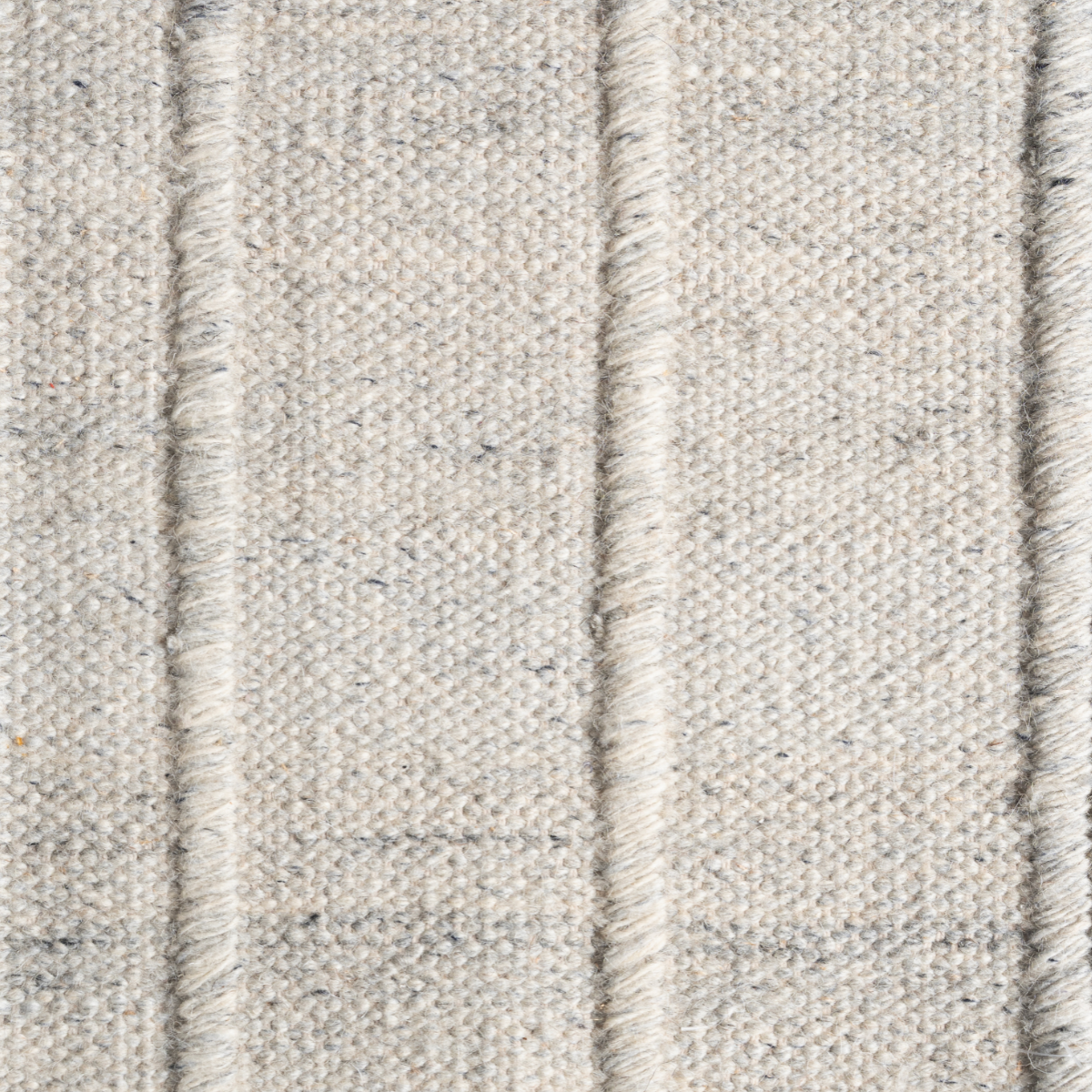 The Ashfield Rib wool rug product view in grey tones