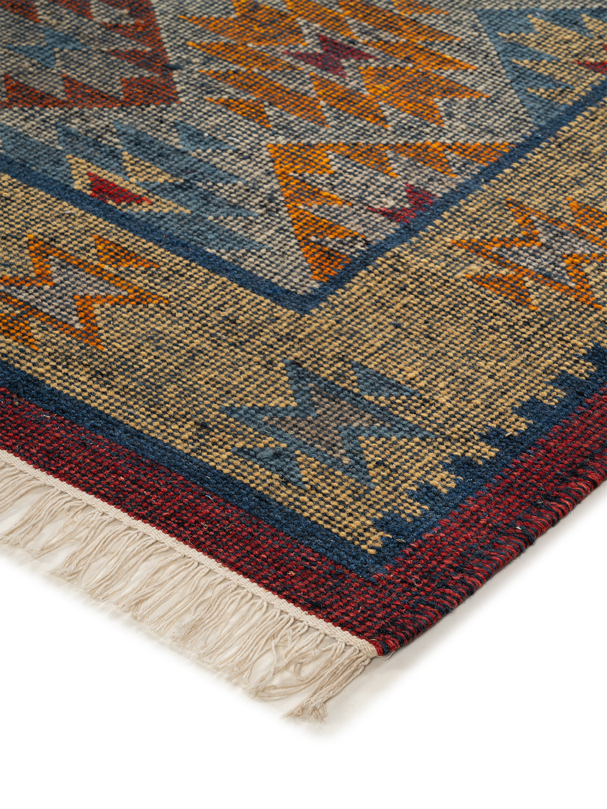 The Aztec Medallion Rug close-up showing the wool weave and traditional motif