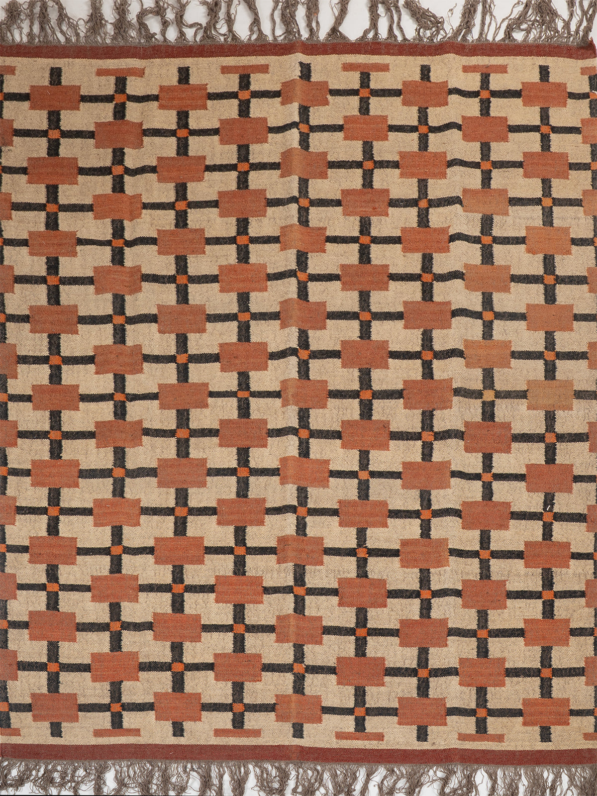 The Blush Ladder wool rug in pink tones