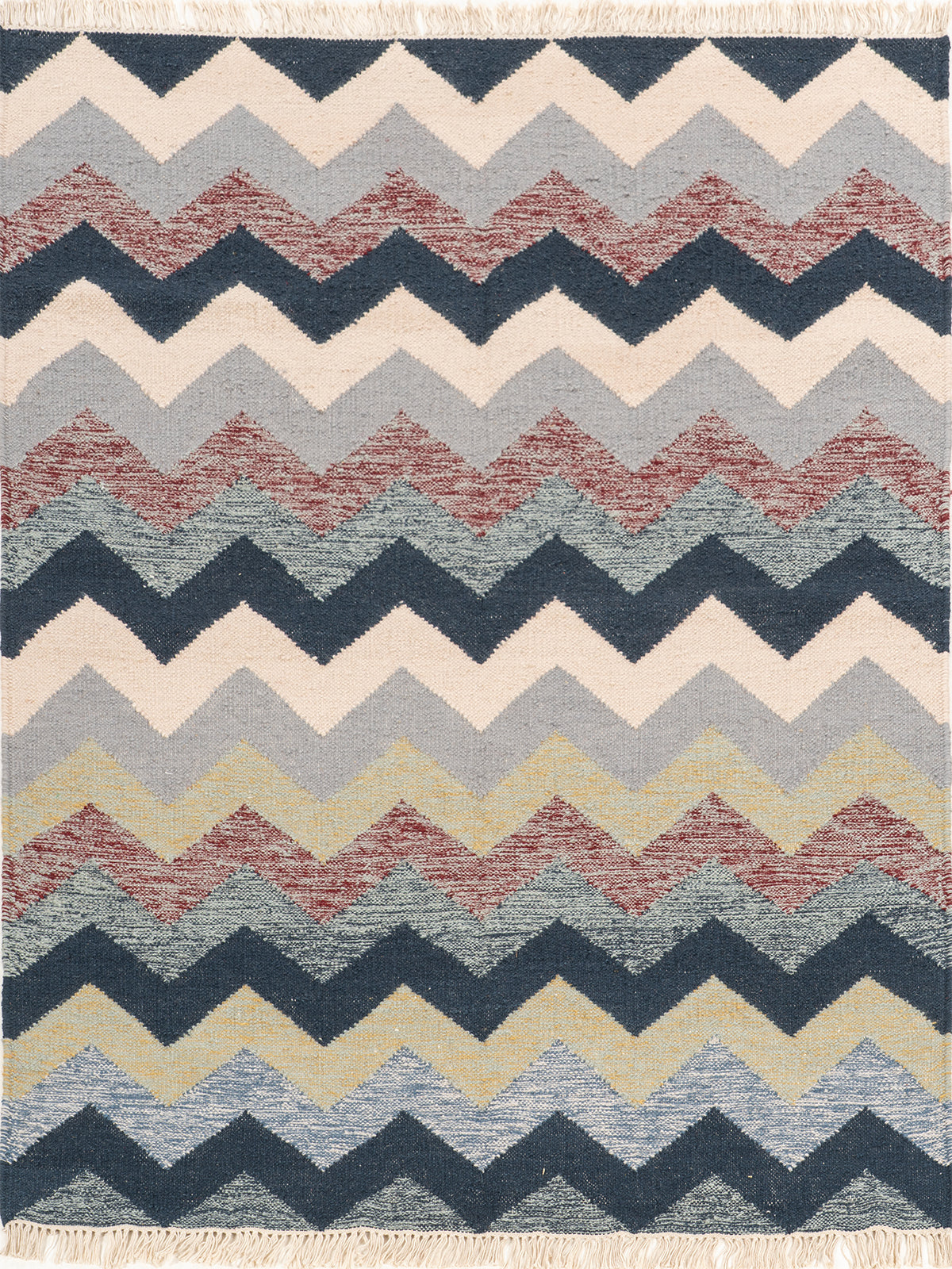 The Coastal Chevron Rug wool rug in blue tones