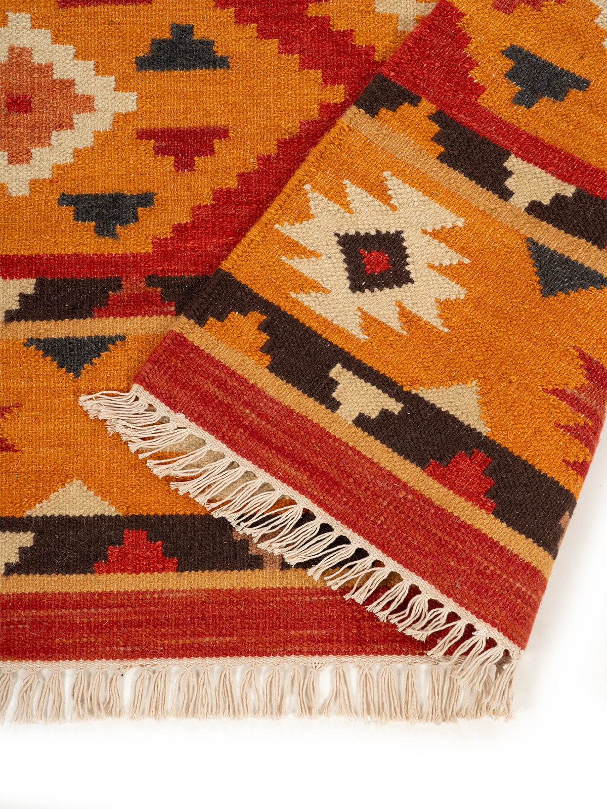 The Desert Sun Rug detail of the geometric pattern in wool