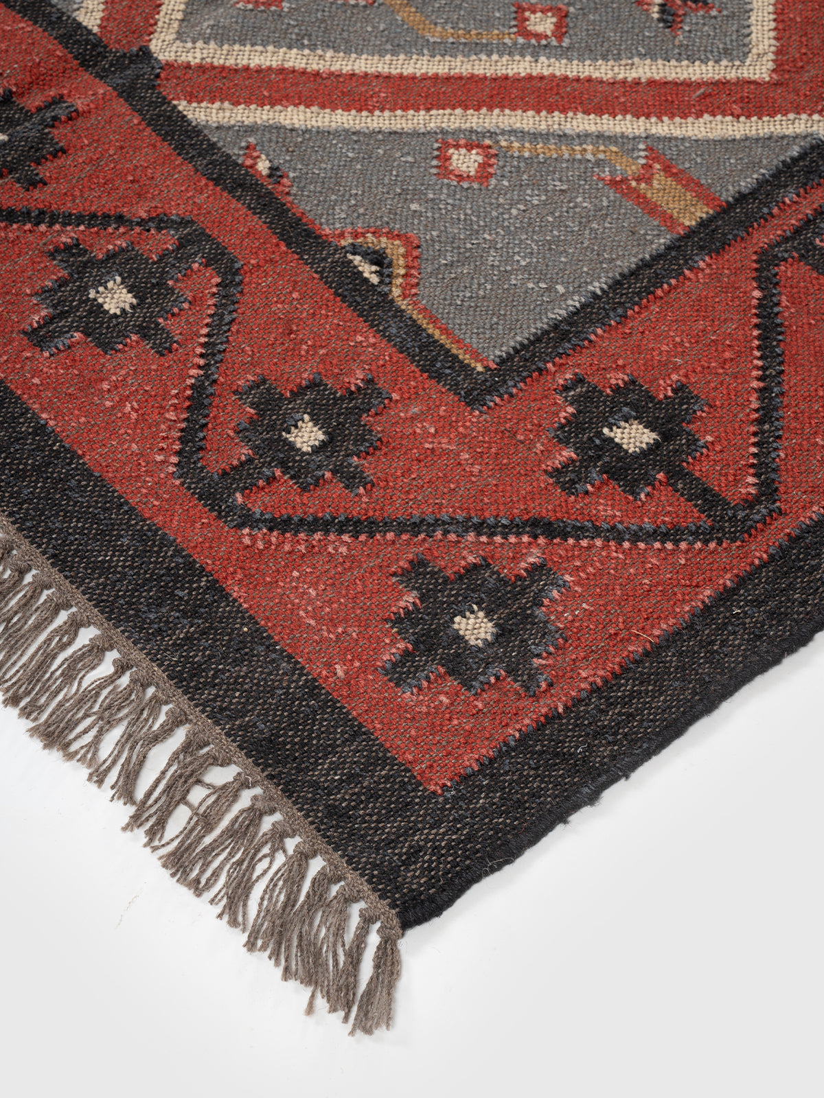 The Diamond Matrix Rug close-up showing the wool weave and geometric motif