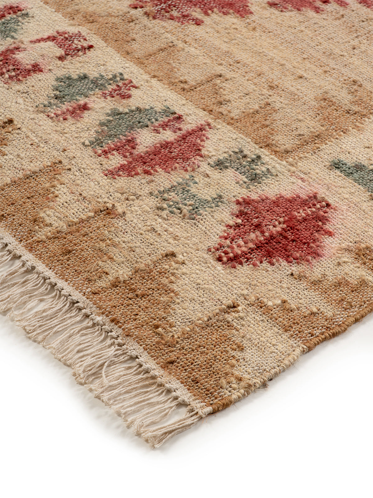 The Earth Medallion Rug close-up showing the jute weave and traditional motif