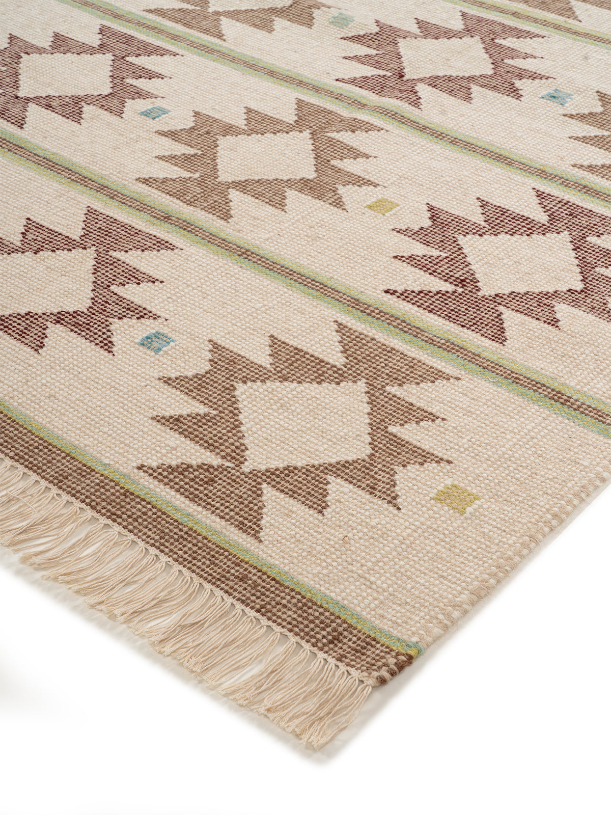 The Earth Weave Rug close-up showing the wool weave and surface texture