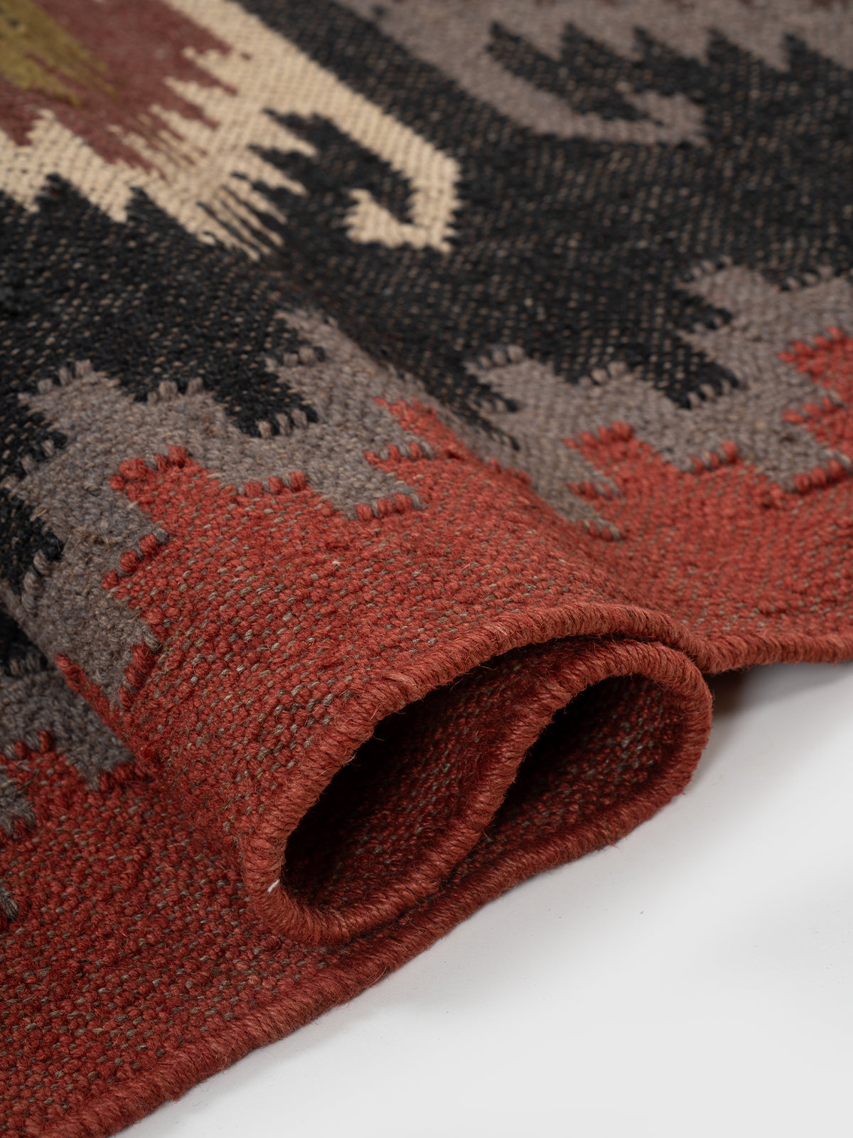 The Ember Diamond Runner - wool runner laid in a hallway view