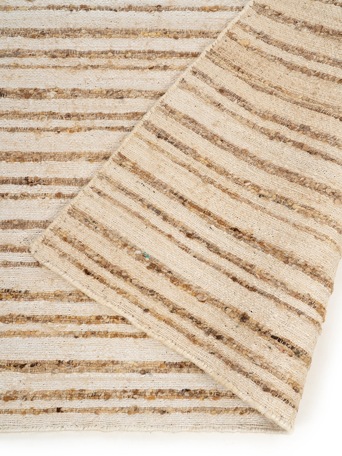 The Hearth Weave Rug detail showing the textured jute surface and finishing