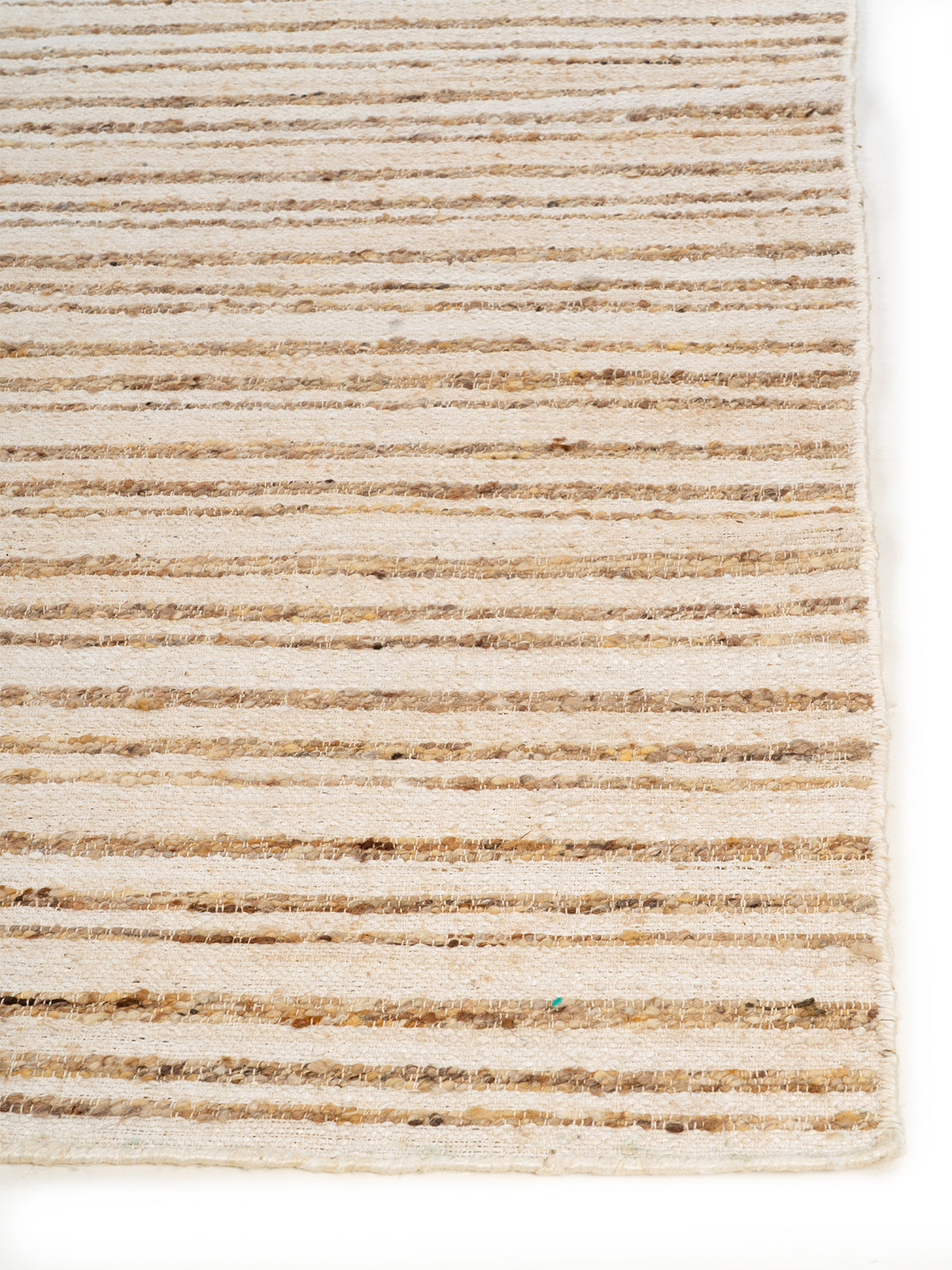 The Hearth Weave Rug jute rug styled in a living room interior