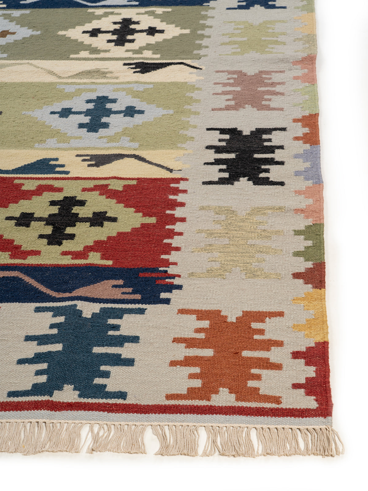 The Highland Spirit Rug wool rug styled in a living room interior