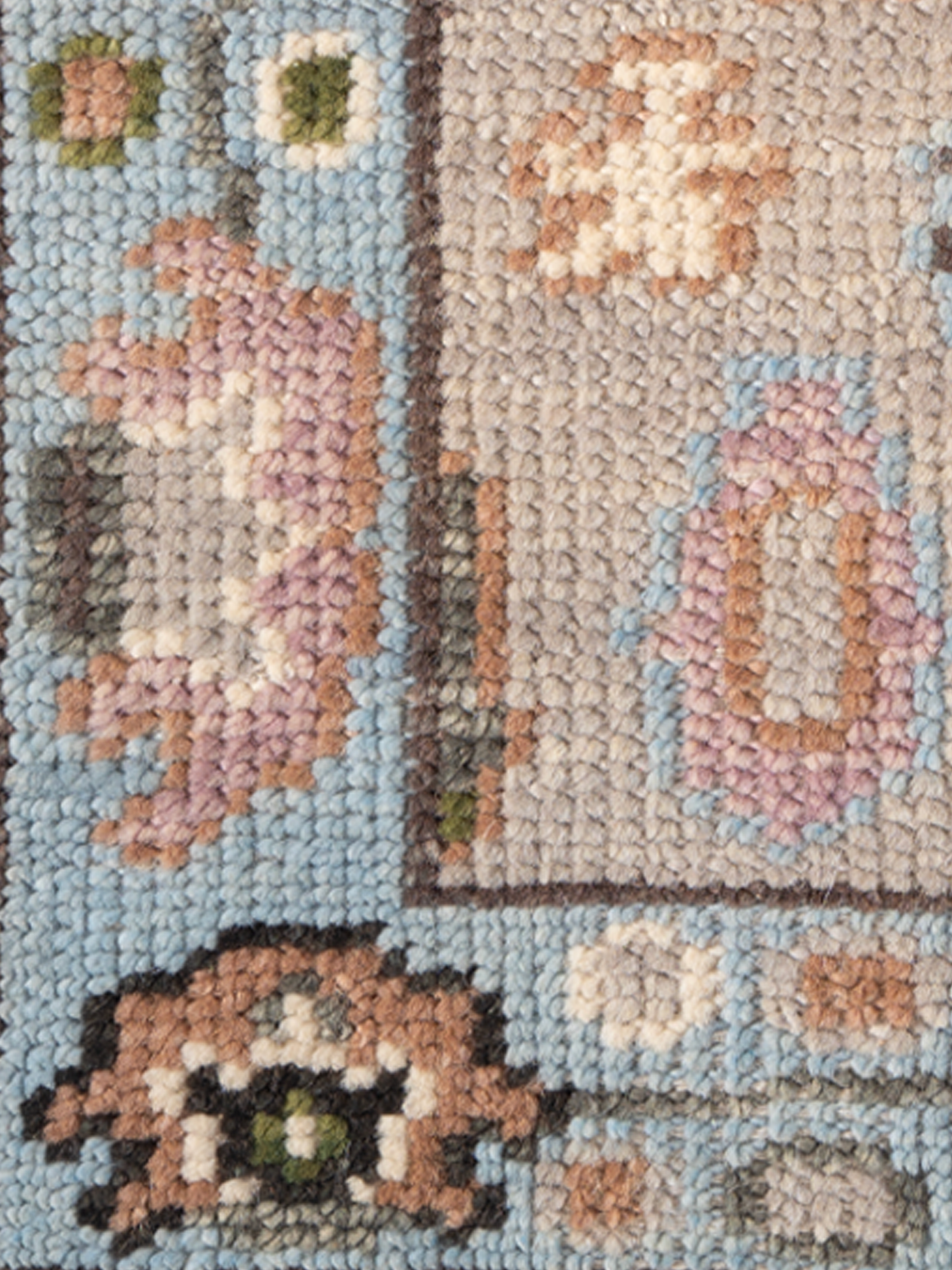 The Indigo Oasis close-up showing the nz wool weave and geometric motif