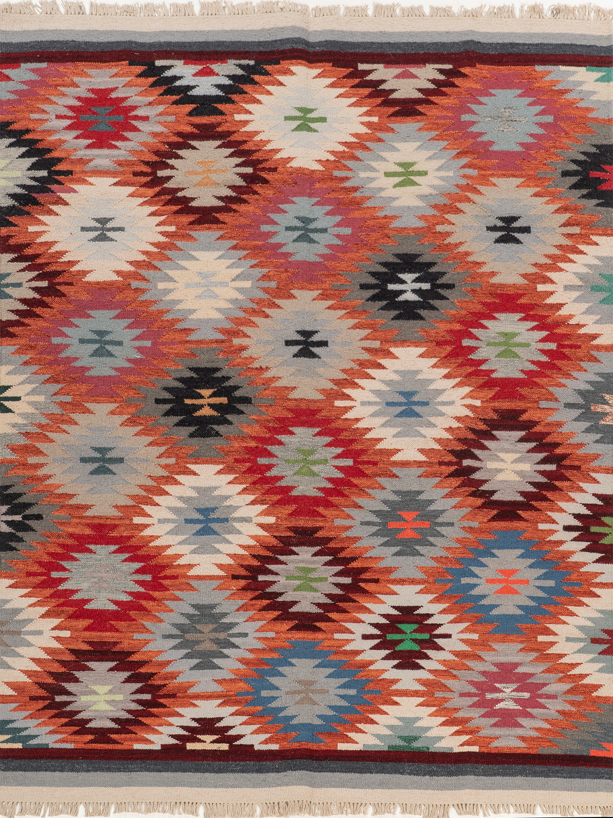 The Kaleidoscope Rug wool rug in multicoloured tones
