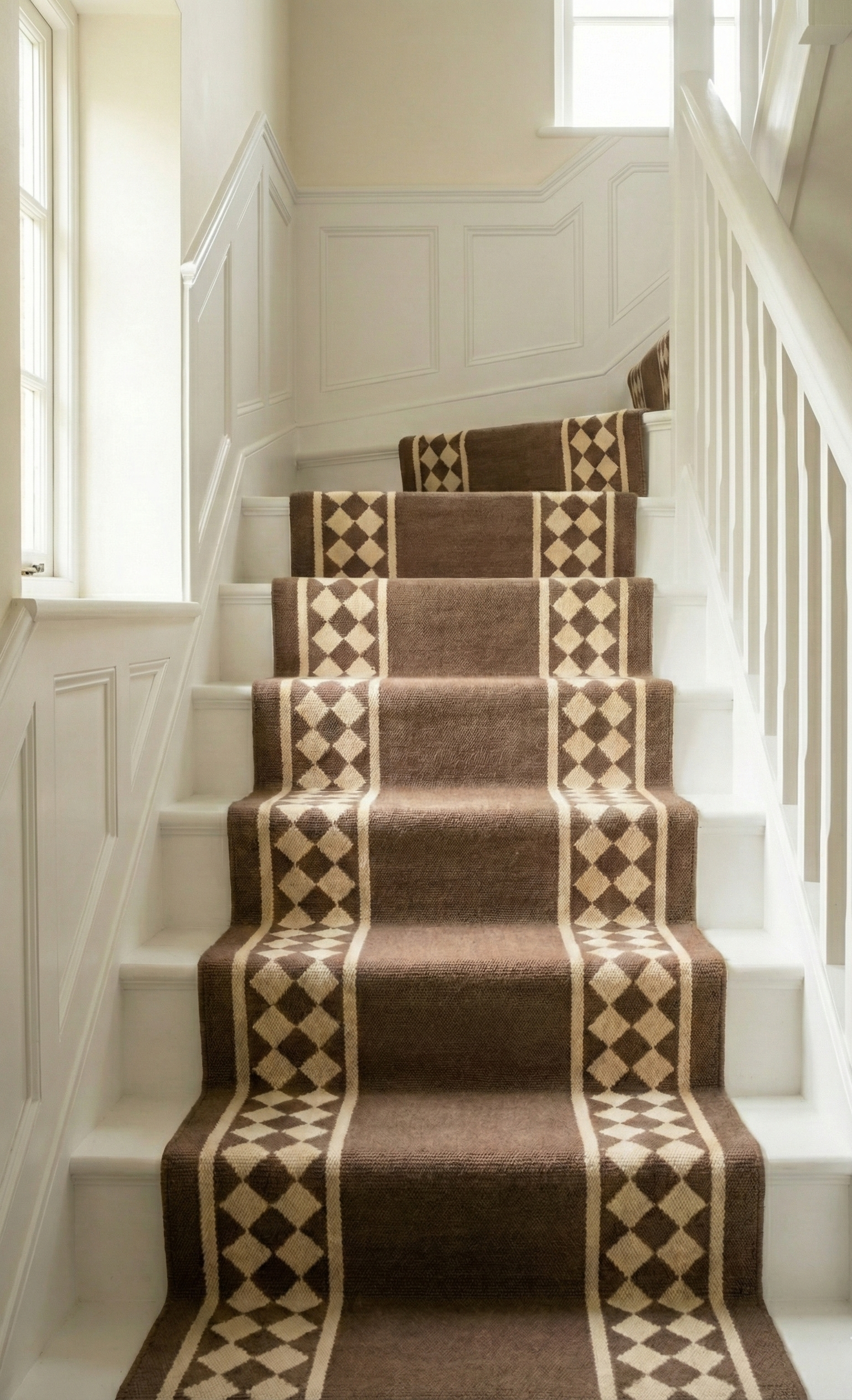 The Lattice Lane Runner cotton stair runner styled on a staircase in a designed interior