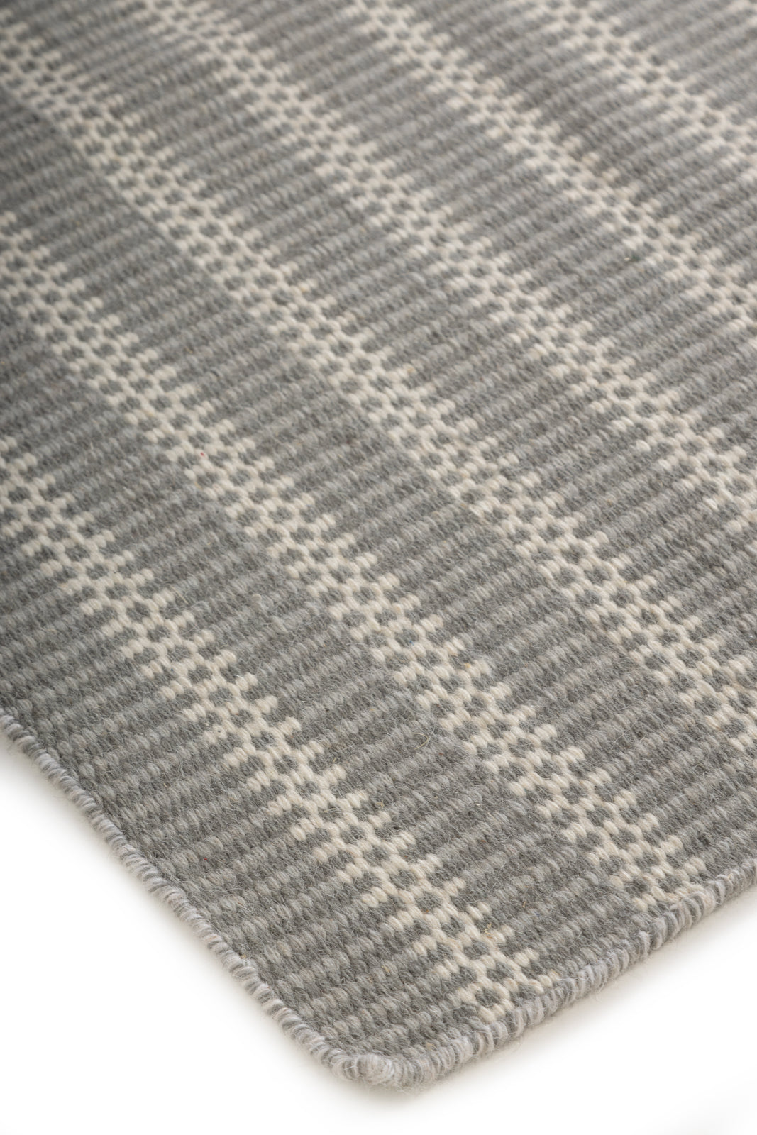 The Linear Calm close-up showing the wool weave and striped pattern