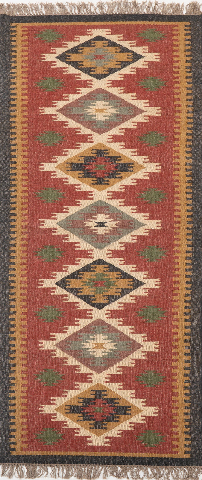 The Lunar Arrowhead wool rug in grey tones