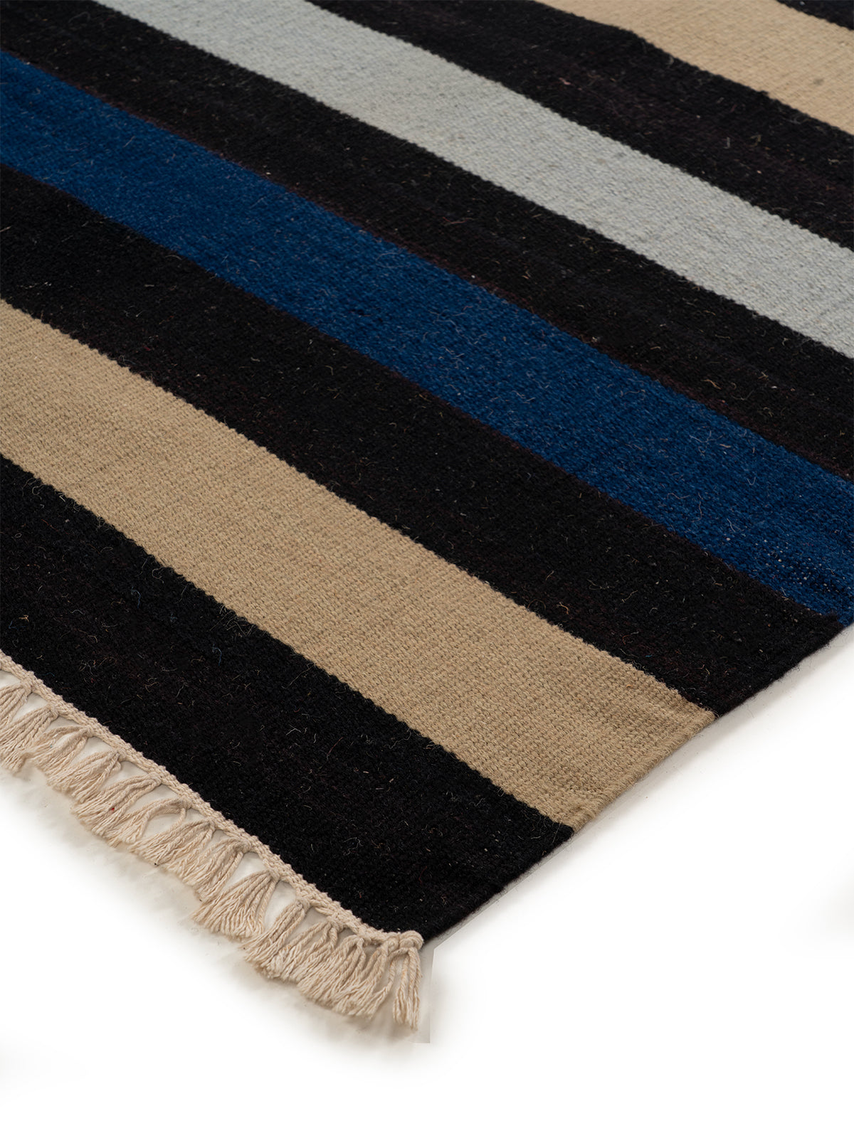 The Midnight Stripes Rug close-up showing the wool weave and striped pattern