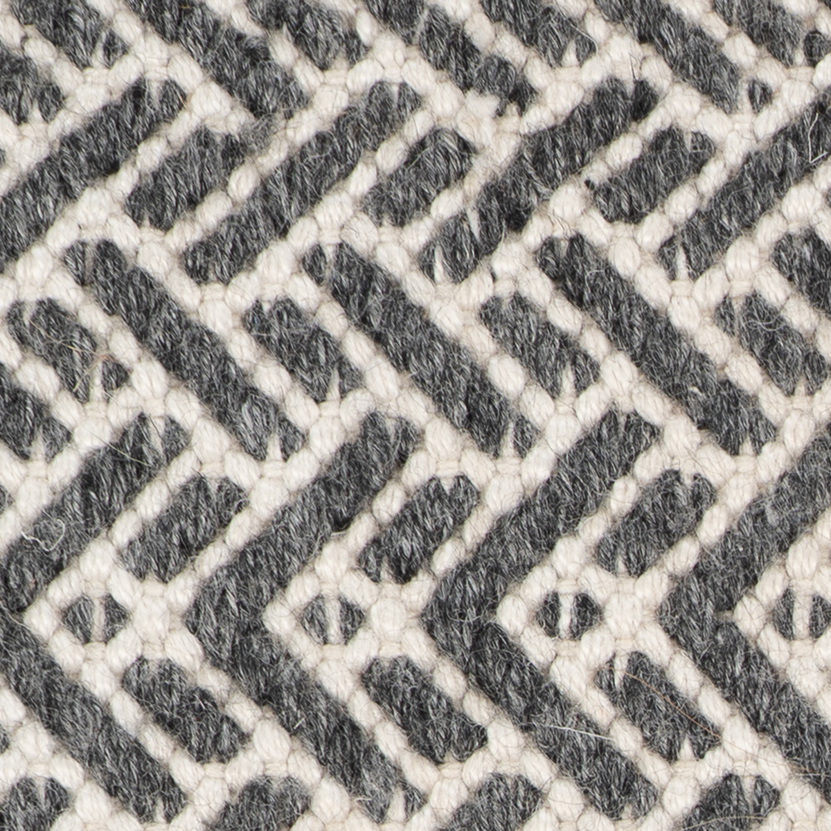 The Modern Labyrinth close-up showing the recycled pet weave and geometric motif