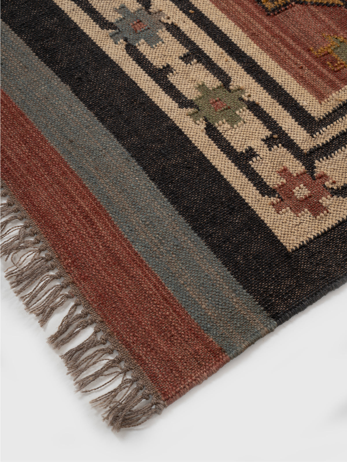 The Mythic Panels Runner close-up showing the wool weave and traditional surface