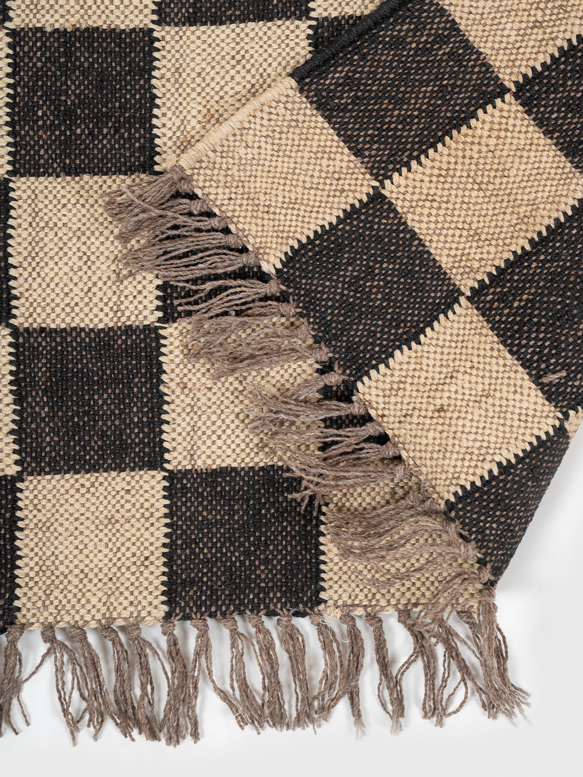The Neutral Block Runner detail showing edge binding and wool finishing of the runner