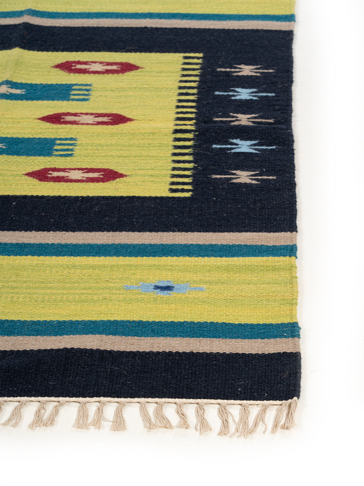 The Night Sky Rug wool rug styled in a living room interior