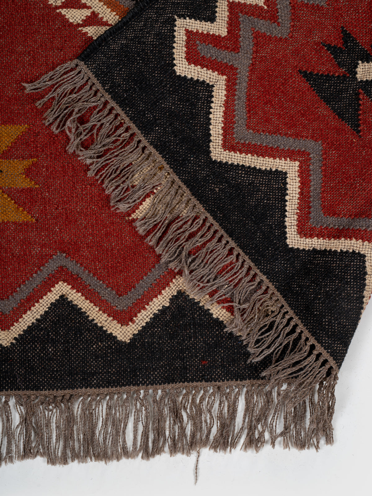 The Nomadic Star Kilim detail of the geometric pattern in wool
