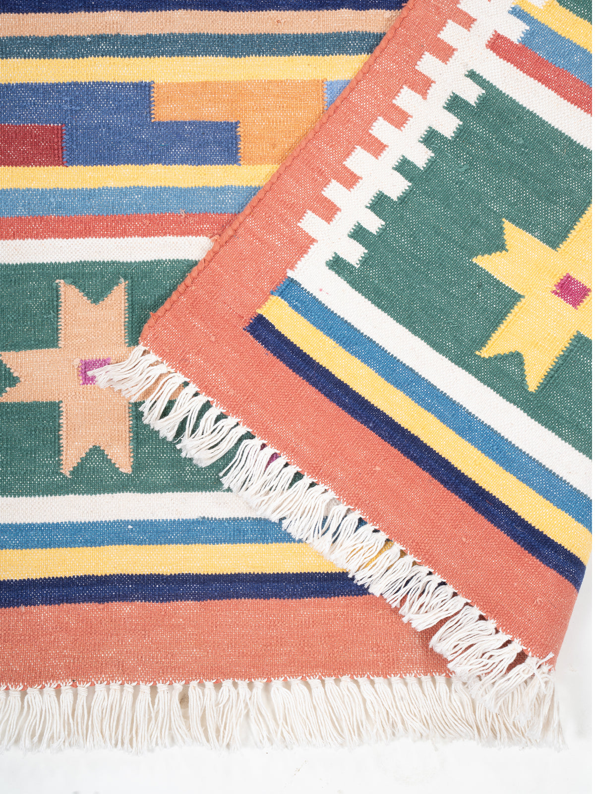 The Nomad's Weave Runner detail showing edge binding and cotton finishing of the runner